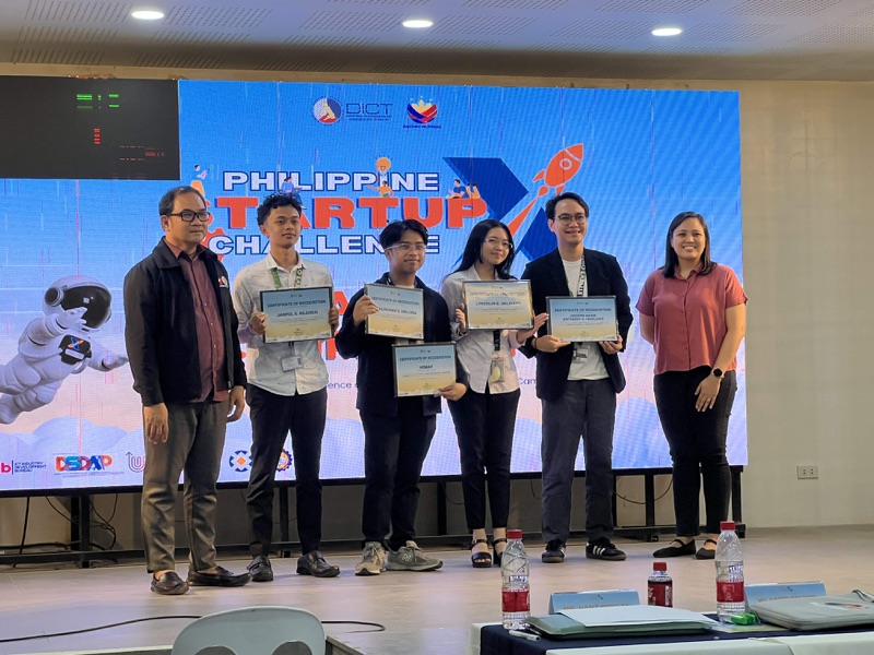 The HiWay team on stage with certificates of recognition at the Philippine Startup Challenge X regional finals.
